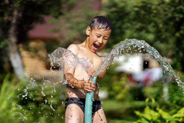 Boy Splash Water Hot Summer Day Outdoors — Stock Photo, Image