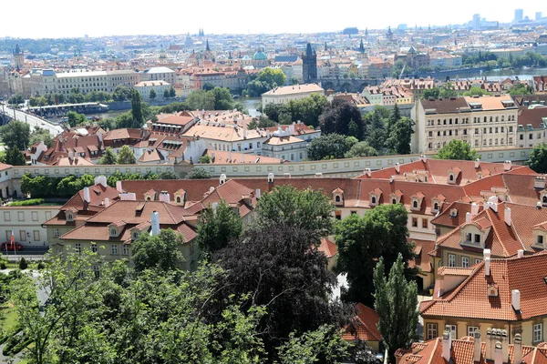 Classic Prague - aerial view to old roof buildings and street, — Stock Photo, Image