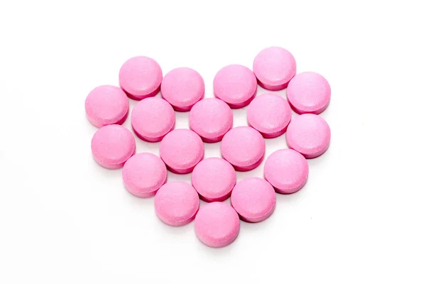 Corazón Píldoras Color Rosa Sobre Fondo Blanco — Foto de Stock