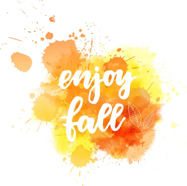 Enjoy fall calligraphy on watercolor splash — Stock Vector