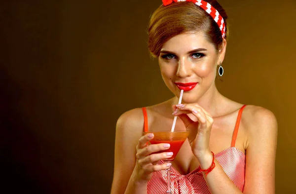 Pin up girl drink bloody Mary cocktail. Pin-up retro female style.