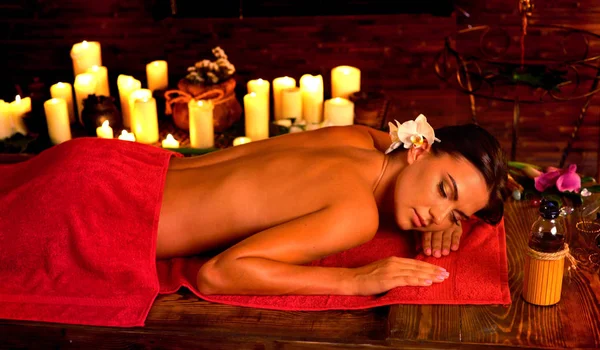 Massage of woman in spa salon. Luxary interior oriental therapy . — Stock Photo, Image