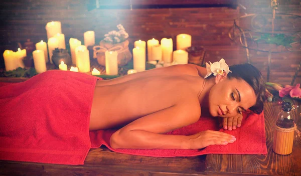 Massage of woman in spa salon. Luxary interior oriental therapy . — Stock Photo, Image