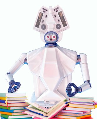 Robot öğretmen çocuk için kitap ile. Beyaz plastik robotik cihaz.