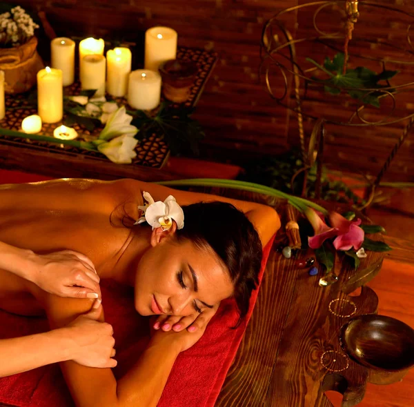 Aromatherapy massage of woman in spa salon. — Stock Photo, Image