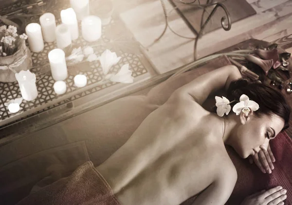 Massage of woman in spa salon. Luxary interior oriental therapy . — Stock Image Massage of woman in spa salon. Luxary interior oriental therapy . Stock Photo