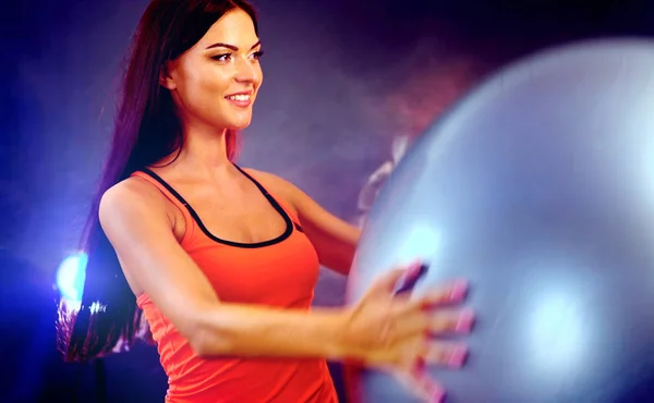 Fitness girl exercising Swiss ball in fitball gym — Stock Photo, Image