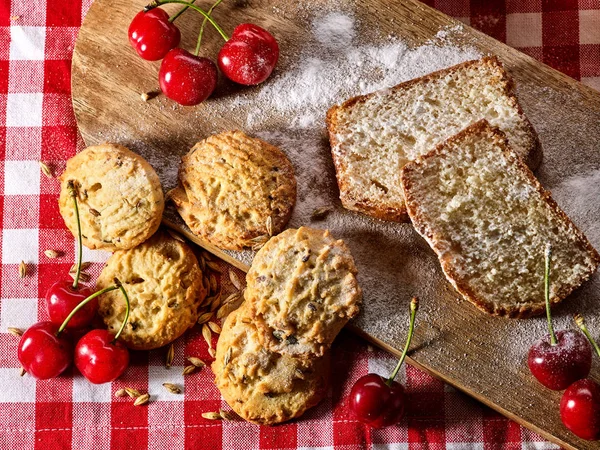 Oatmeal cookies snack and cherry breakfast close up