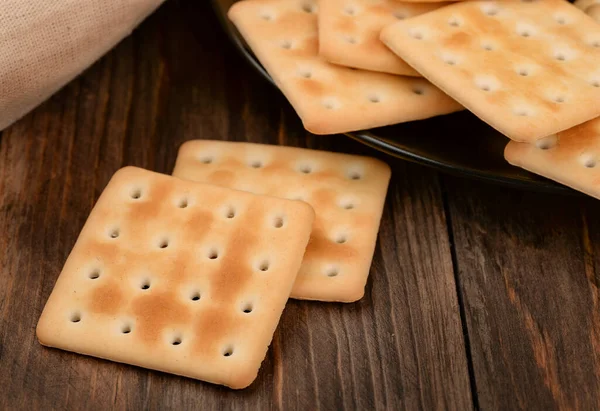 Saltine Crackers Dark Wooden Table — Stock Photo, Image