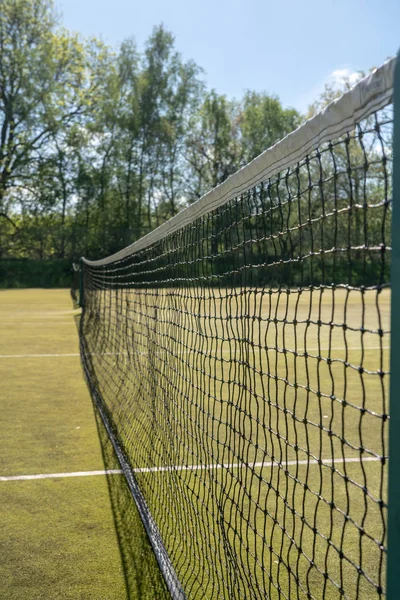 Detalj av tennis netto på domstolen — Stockfoto