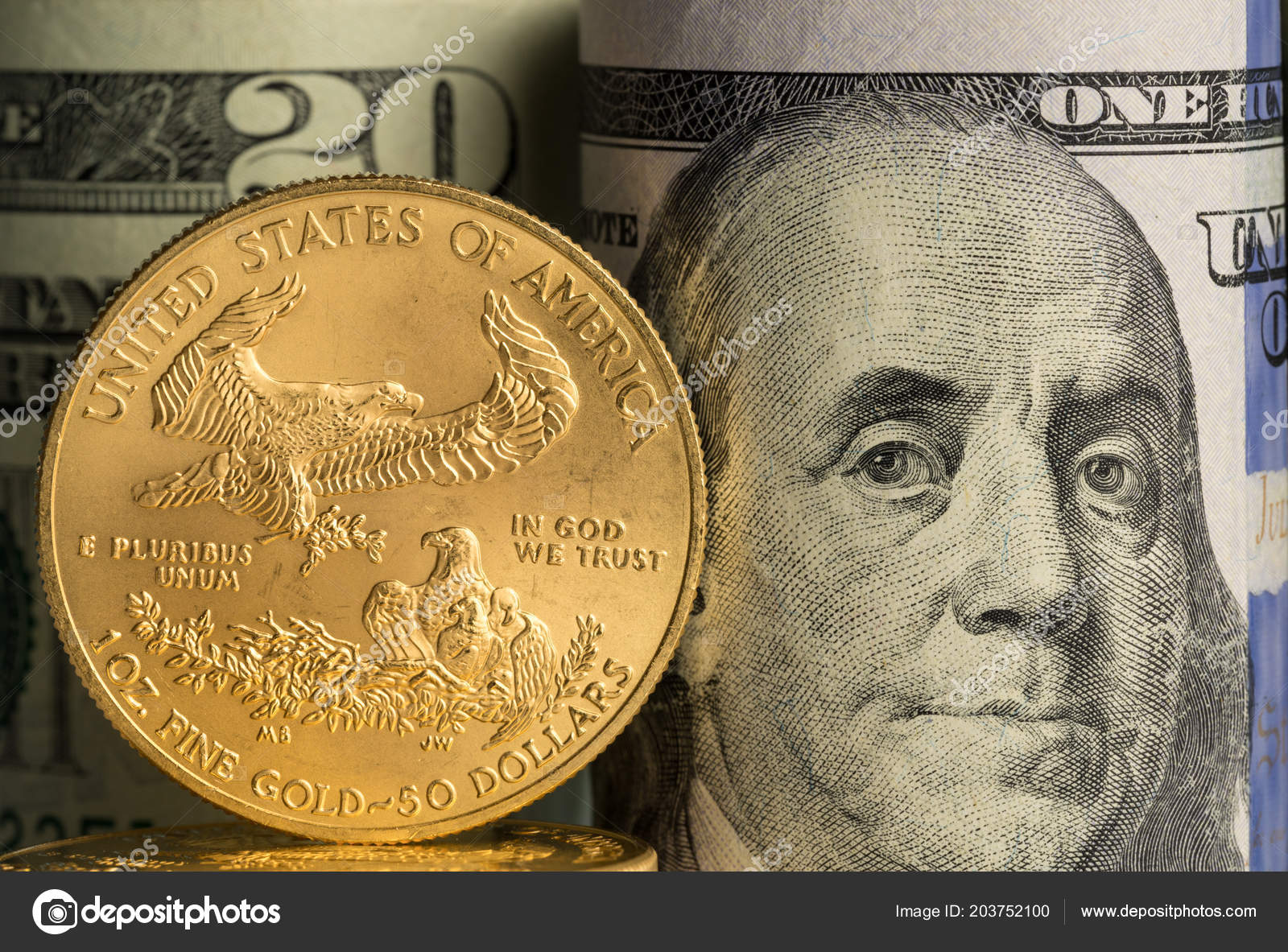 Pure gold coins in front of bank rolls of US currency Stock Editorial Photo © steveheap 203752100