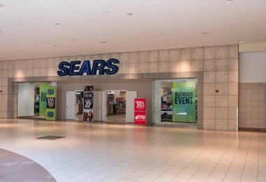 Entrance to Sears store at Dulles Town Center in Loudon County, Virginia clipart