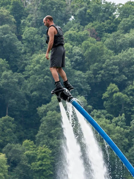 Man riding a hydroflight x-board on lake — Stock Photo, Image