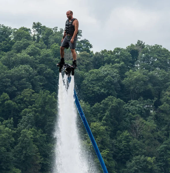 Man riding a hydroflight x-board on lake — Stock Photo, Image