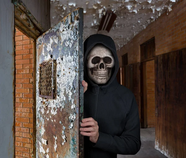 Halloween theme of man with skull mask welcoming you to prison — Stock Photo, Image