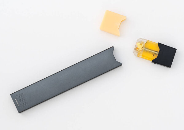 JUULpods and dispenser containing different flavors of nicotine