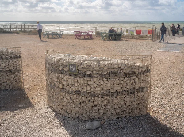 Parking space for disabled driver built from beach pebbles — Stock Photo, Image