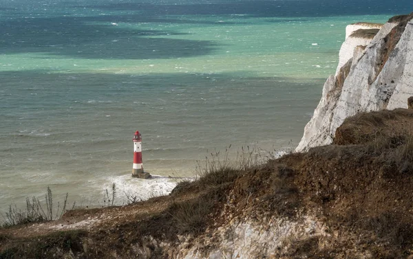 Farol de cabeça de praia no dia ventoso — Fotografia de Stock