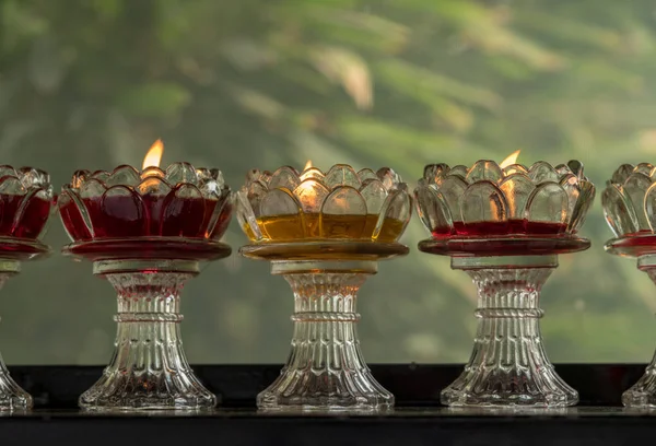Votive candles in glass dishes at Wild Goose Pagoda