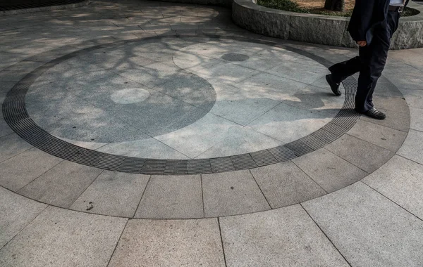 Yin Yang symbol on floor at Taoist temple at Laoshan near Qingdao