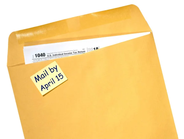 Tax Day reminder for April 15 on envelope — Stock Photo, Image