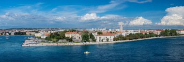 Cruise ship leaving dock at Port of Zadar in Croatia clipart