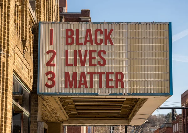Mockup of movie cinema billboard with Black Lives Matter on the message board