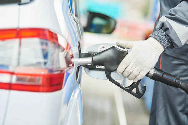 Fuelling diesel fuel into automobile at filling station — Stock Photo, Image