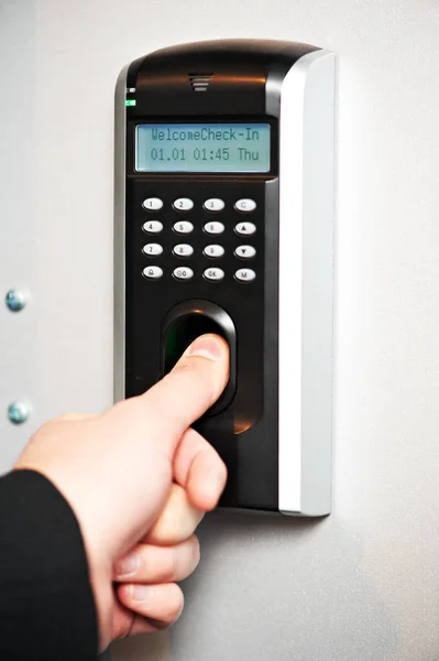 Identification. Fingerprint scanning is used to pass access control — Stock Photo, Image