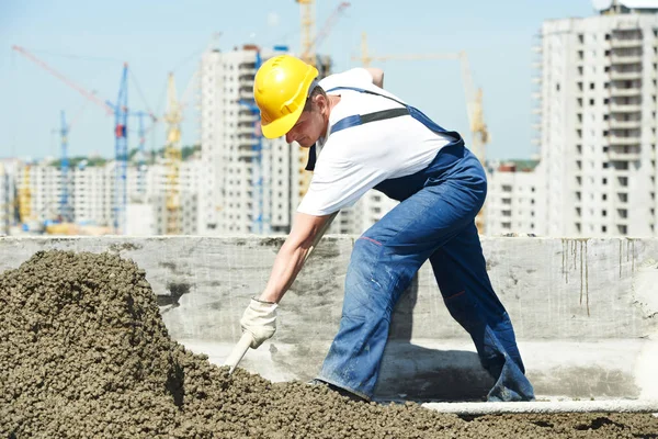 Roof construction. worker roofer leveling with float lute — Stock Image Roof construction. worker roofer leveling with float lute Stock Image
