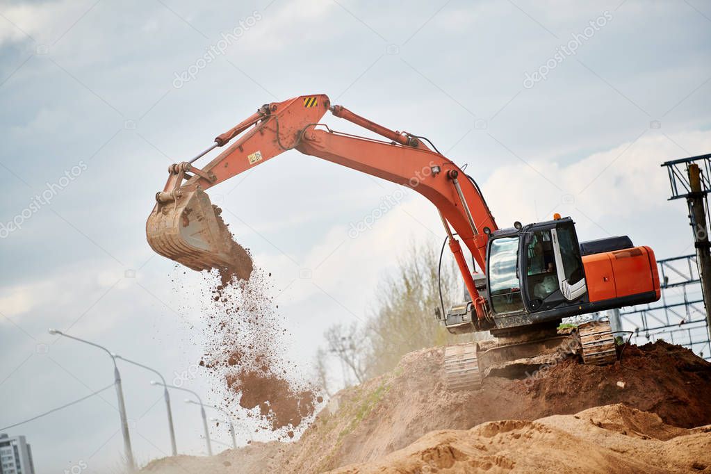 Excavator Loader at earth moving works
