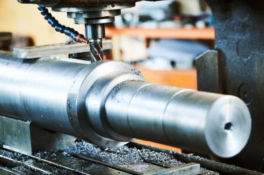 Öğütme metal işleme işlemi. Şaft groove dikey değirmen tarafından işleme