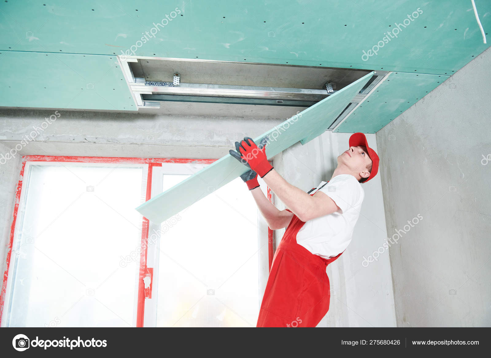 Gypsum Plasterboard Construction Work At Suspended Ceiling