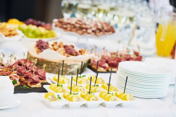 Catering service. snack at food court table during event