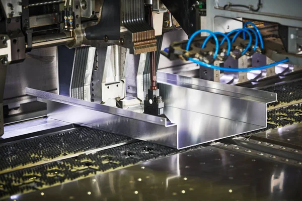 Panel bending machine at work. process of metal sheet forming — Stock Photo, Image