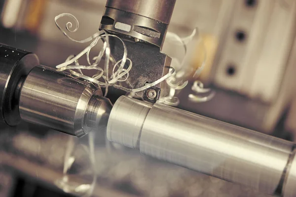 Cutting tool at metal working. Turning on lathe — Stock Photo, Image