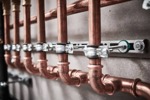 Plumbing service. copper pipeline of a heating system in boiler room