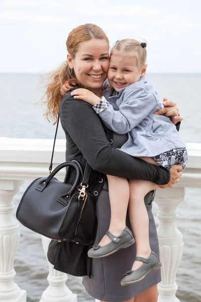 Smiling Mother Holding Arms Her Heavy Little Daughter Girl Embracing — Stock Photo, Image