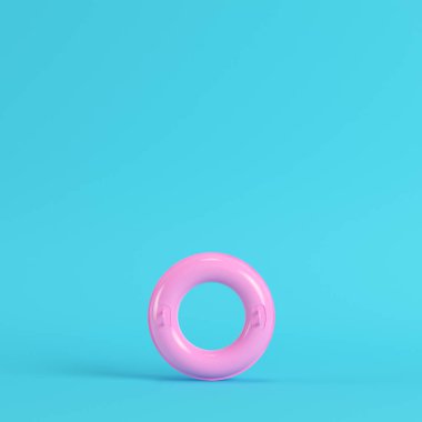 Parlak mavi arka plan pastel renkler pembe şişme yüzüğü. Minimalizm kavramı. 3D render