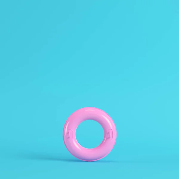 Roze Opblaasbare Ring Heldere Blauwe Achtergrond Pastel Kleuren Minimalisme Concept Stockfoto