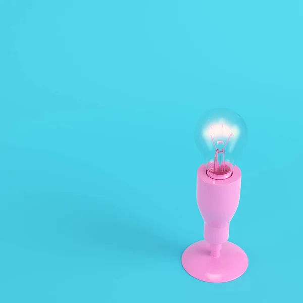 Pink lamp with glowing light bulb on bright blue background in pastel colors. Minimalism concept. 3d render