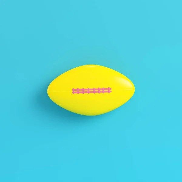 Bola Futebol Americano Amarelo Fundo Azul Brilhante Cores Pastel Conceito — Fotografia de Stock