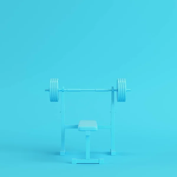 Barbell con banco sobre fondo azul brillante en colores pastel. M —  Fotos de Stock