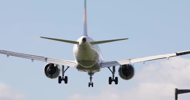 Airplane landing at London Heathrow seen from behind — Stock Video