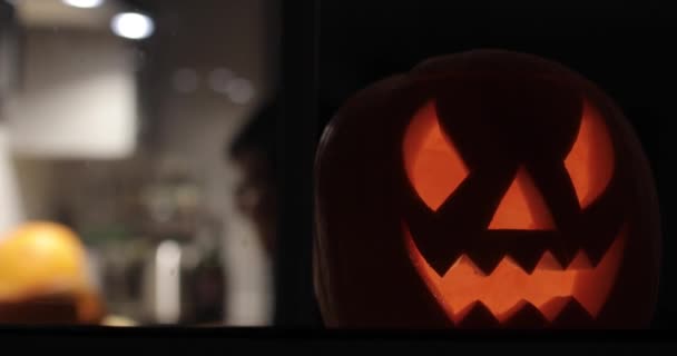 Woman Carving Pumpkin Halloween Night View Window Young Woman Kitchen — Stock Video