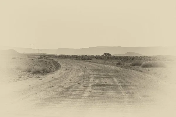 Desolate infinity of the Rocky hills of the Negev Desert in Israel. Breathtaking landscape and nature of the Middle East. Black and white photo