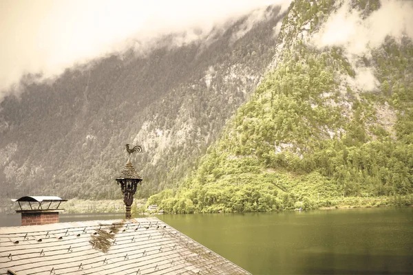 Austrian landscape with wet roofs.