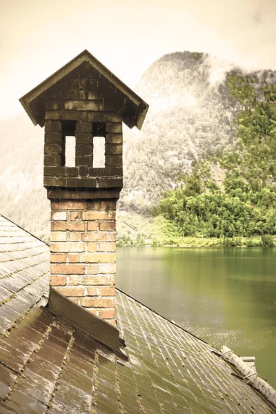 Austrian landscape with wet roofs.