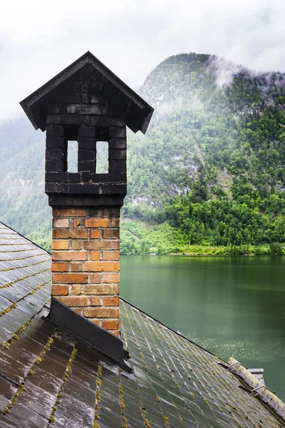 Austrian landscape with wet roofs.