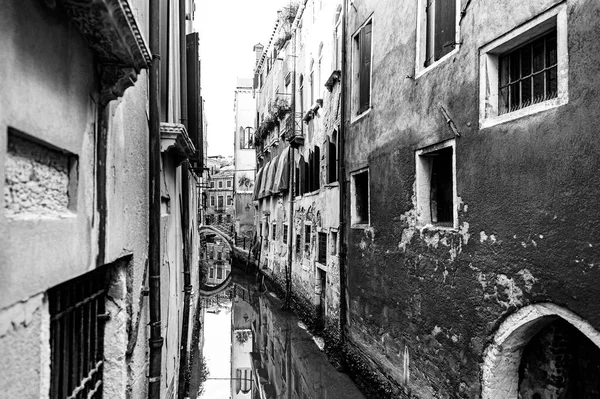 Deserted Venice in black and white. Museum City is situated across a group of islands that are separated by canals and linked by empty bridges.